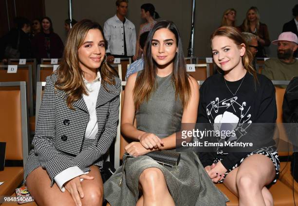 Georgie Flores, Melissa Barrera and Britt Robertson attend the Wolk Morais Collection 7 Fashion Show at The Jeremy Hotel on June 26, 2018 in West...