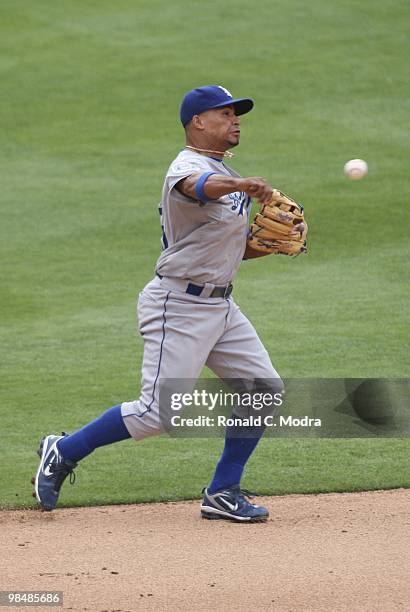 Rafael Furcal of the Los Angeles Dodgers throw to first base during a MLB game against the Florida Marlins at Sun Life Stadium on April 11, 2010 in...