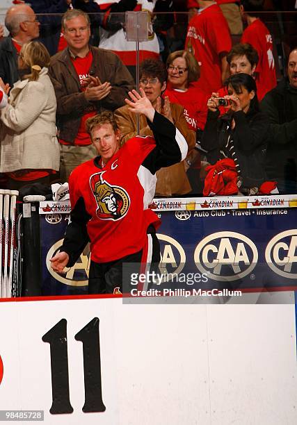 Daniel Alfredsson of the Ottawa Senators acknowledges the fans during the NHL game against the Buffalo Sabres at Scotiabank Place on April 10, 2010...