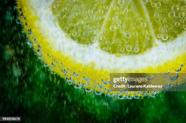 lemon - macro lemon stock pictures, royalty-free photos & images