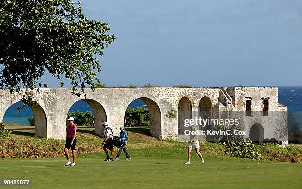 Sophie Gustafson of Sweden and Amanda Blumenherst of the United States walk up the first fairway during the first round of The Mojo 6 Jamaica LPGA...