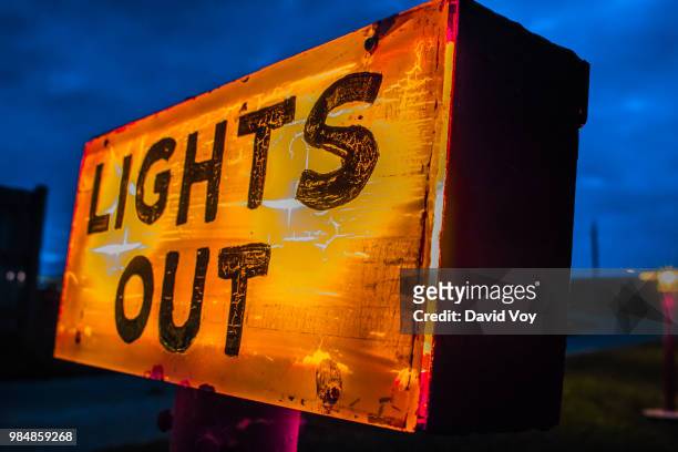lights out sign @ 61 drive-in theatre @ dusk - lights out stock pictures, royalty-free photos & images