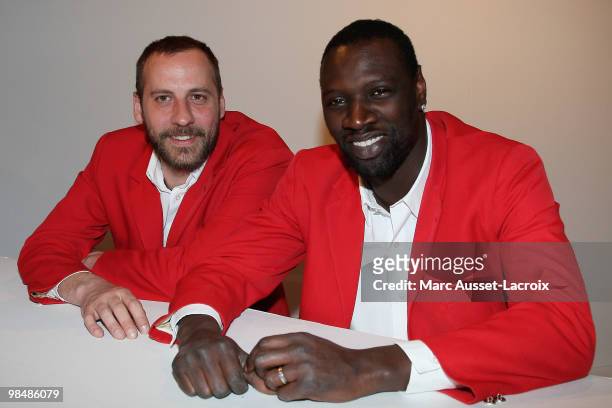 Fred Testot and Omar Sy attend the "Les Doudous Enchantes" auction and party at Palais De Tokyo on April 15, 2010 in Paris, France.