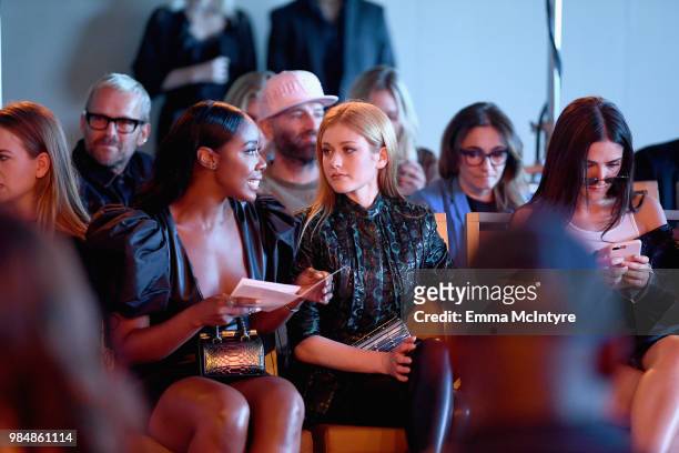 Nia Jervier, Katherine McNamara and Isabelle Fuhrman attend the Wolk Morais Collection 7 Fashion Show at The Jeremy Hotel on June 26, 2018 in West...