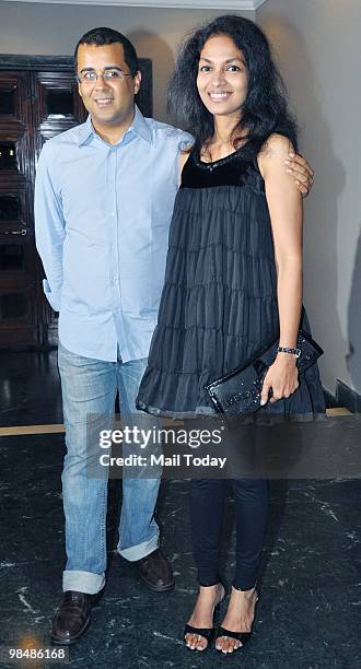 Parvathy Omanakuttan and Chetan Bhagat at an event in Mumbai on April 11, 2010.
