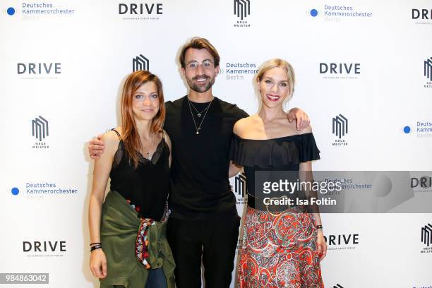 German actress Claudia Eisinger, Blogger David Roth and German actress Julia Dietze during the 8th edition of the Berlin concert series 'Neue...
