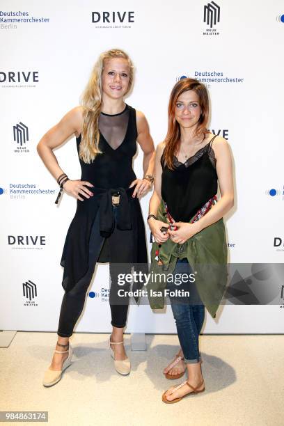 Judo athletet Julia Dorny and German actress Claudia Eisinger during the 8th edition of the Berlin concert series 'Neue Meister' at Volkswagen Group...