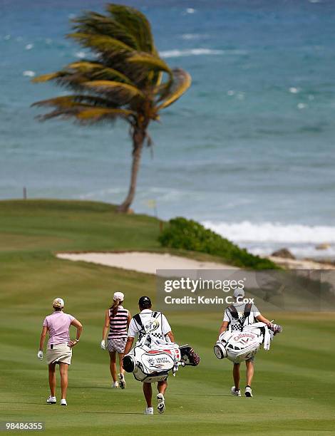 Cristie Kerr of the United States and Beatriz Recari of Spain walk down the fifth fairway during the first round of The Mojo 6 Jamaica LPGA...