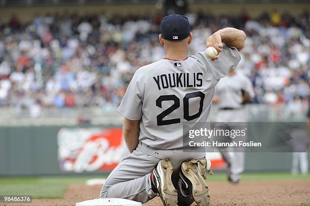 Kevin Youkilis of the Boston Red Sox in the fifth inning against the Minnesota Twins during the Twins home opener at Target Field on April 12, 2010...