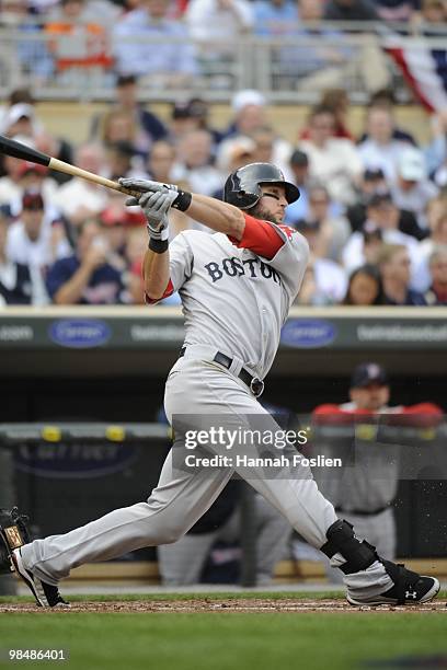 Jeremy Hermida of the Boston Red Sox bats in the third inning against the Minnesota Twins during the Twins home opener at Target Field on April 12,...