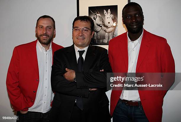 Fred Testot, CEO of Lagardere Active Didier Quillot and Omar Sy attend the "Les Doudous Enchantes" auction and party at Palais De Tokyo on April 15,...