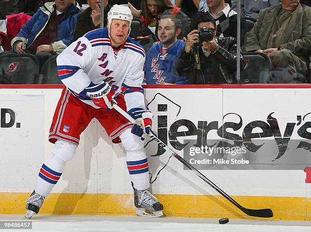 Olli Jokinen of the New York Rangers skates against the New Jersey Devils at the Prudential Center on March 10, 2010 in Newark, New Jersey. Devils...