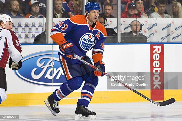 Jason Strudwick of the Edmonton Oilers concentrates on the puck against the Colorado Avalanche at Rexall Place on April 7, 2010 in Edmonton, Alberta,...