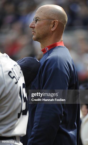 Terry Francona of the Boston Red Sox during the National Anthem prior to a game against the Minnesota Twins during the Twins home opener at Target...