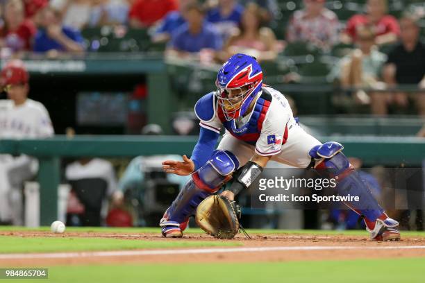 Texas Rangers Catcher Robinson Chirinos makes a play on a throw to the plate during the game between the San Diego Padres and Texas Rangers on June...