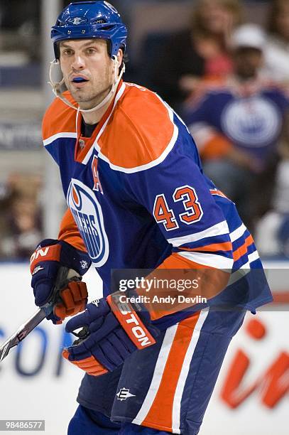 Jason Strudwick of the Edmonton Oilers conentrates on the puck against the Colorado Avalanche at Rexall Place on April 7, 2010 in Edmonton, Alberta,...