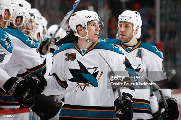 Logan Couture of the San Jose Sharks celebrates after scoring a goal against the Minnesota Wild during the game at the Xcel Energy Center on April 2,...