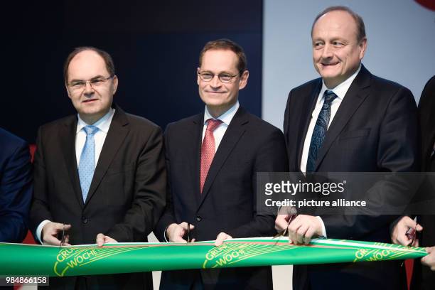German Agriculture Minister Christian Schmidt of the Christian Social Union , Berlin's mayor Michael Mueller of the Social Democratic Party and...