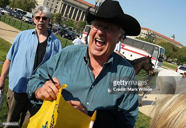 Former House Majority Leader Dick Armey joins Tea Party supporters on the grounds of the Washington Monument on April 15, 2010 in Washington, DC. The...