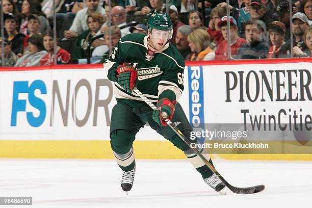 Nick Schultz of the Minnesota Wild skates with the puck against the San Jose Sharks during the game at the Xcel Energy Center on April 2, 2010 in St....