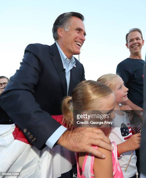 Mitt Romney takes pictures with supporters after his victory rally on June 26, 2018 in Orem, Utah. Romney was declared the winner over his challenger...