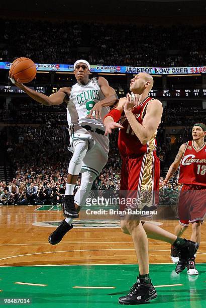 Rajon Rondo of the Boston Celtics goes to the basket against Zydrunas Ilgauskas of the Cleveland Cavaliers during the game on April 4, 2010 at TD...