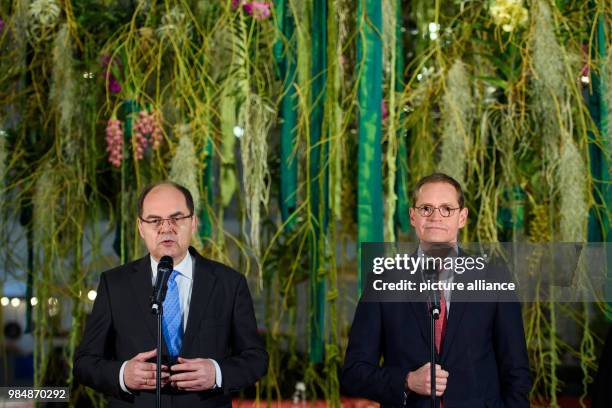 Agriculture Minister Christian Schmidt of the Christian Social Union and Berlin's mayor Michael Mueller of the Social Democratic Party give a press...