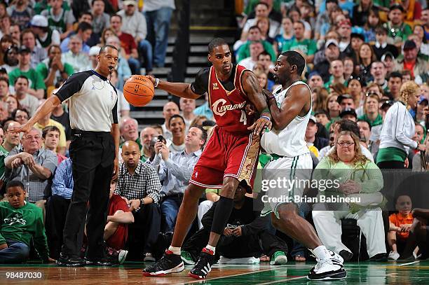 Antawn Jamison of the Cleveland Cavaliers posts up against Michael Finley of the Boston Celtics during the game on April 4, 2010 at TD Banknorth...