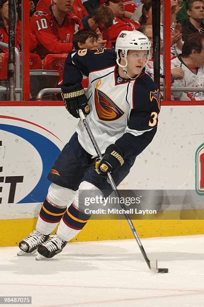 Tobias Enstrom of the Atlanta Thrashers skates with the puck during a NHL hockey game against the Washington Capitals on April 9, 2010 at the Verizon...