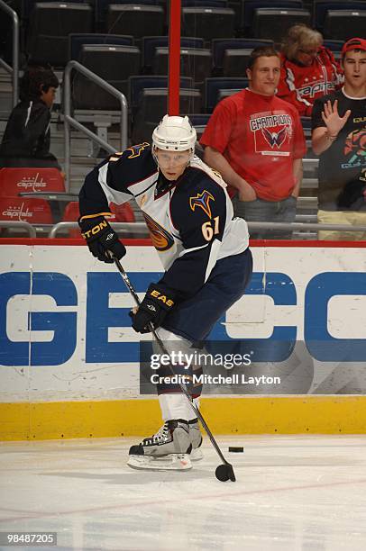 Maxim Afinogenov of the Atlanta Thrashers skates with the puck during a NHL hockey game against the Washington Capitals on April 9, 2010 at the...