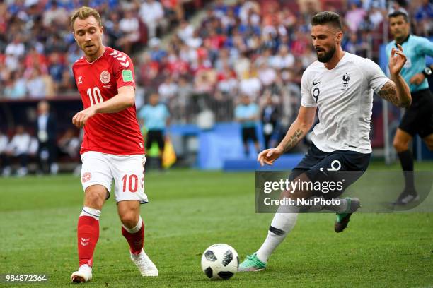 Christian Eriksen of Denmark and Olivier Giround of France during the 2018 FIFA World Cup Group C match between Denmark and France at Luzhniki...