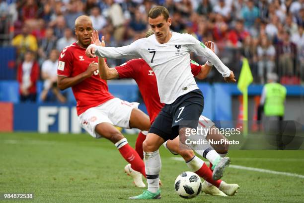 Antoine Griezmann of France in action Jens Stryger Larsen and Mathias Jorgensen of Denmark during the 2018 FIFA World Cup Group C match between...