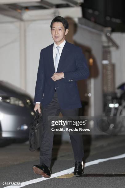 Kei Moriya, fiance of Japanese Princess Ayako, is pictured as he returns home in Tokyo on June 26 after their engagement was announced earlier in the...
