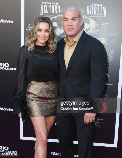 Tito Ortiz and Amber Nicole Miller attend Columbia Pictures' "Sicario: Day Of The Soldado" Premiere at Westwood Regency Theater on June 26, 2018 in...