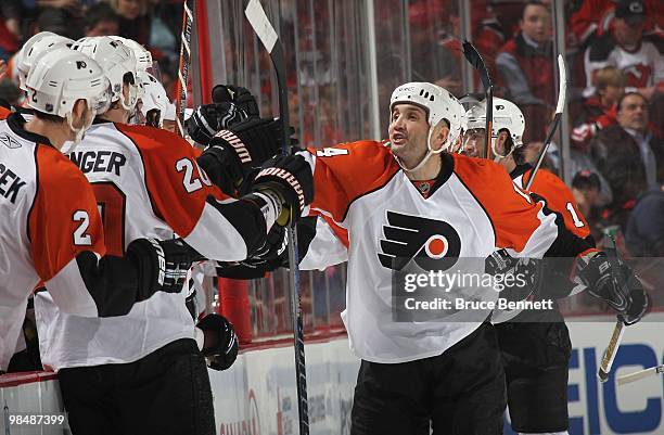 Ian Laperriere of the Philadelphia Flyers celebrates a second period goal during the second period against the New Jersey Devils in Game One of the...