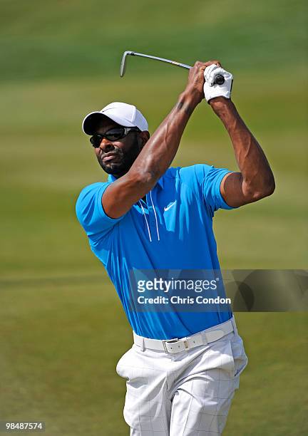 Former NFL star Jerry Rice plays a shot in his Nationwide Tour debut during the first round of the Fresh Express Classic at TPC Stonebrae on April...