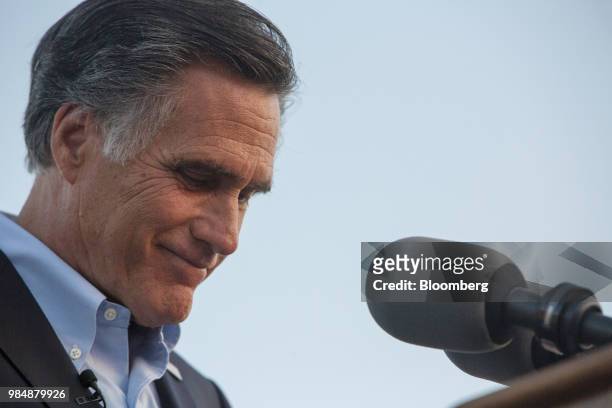 Mitt Romney, Republican U.S Senate candidate, pauses during a speech at an election night rally in Provo, Utah, U.S., on Tuesday, June 26, 2018....