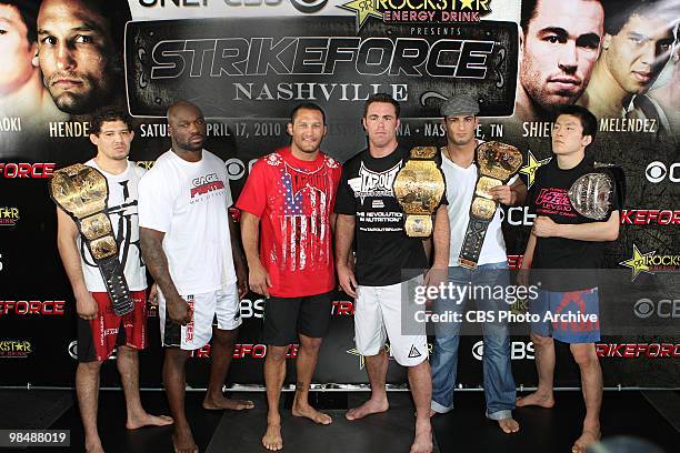 Mixed martial arts fighters Gilbert Melendez, "King Mo" Lawal, Dan Henderson, Jake Shields, Gegard Mousasi and Shinya Aoki pose for reporters during...