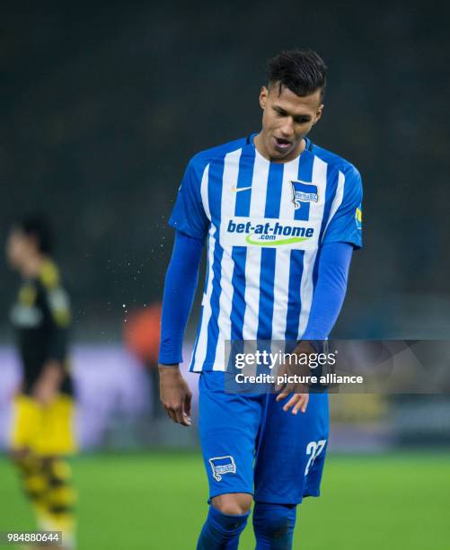 Hertha BSC and Borussia Dortmund face off in Bundesliga match in Berlin, Germany, 19 January 2018. Berlin's Davie Selke's bows his head. Photo:...