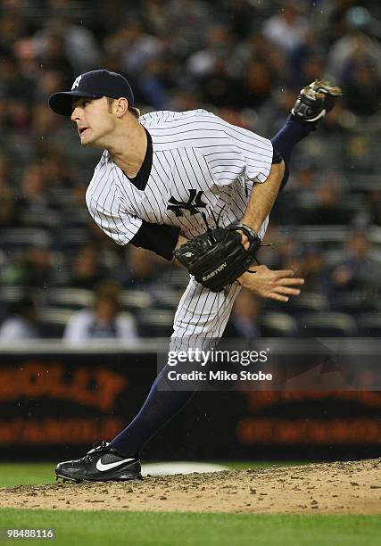 David Robertson of the New York Yankees delivers a pitch in the fifth inning against the Los Angeles Angels of Anaheim on April 15, 2010 in the Bronx...