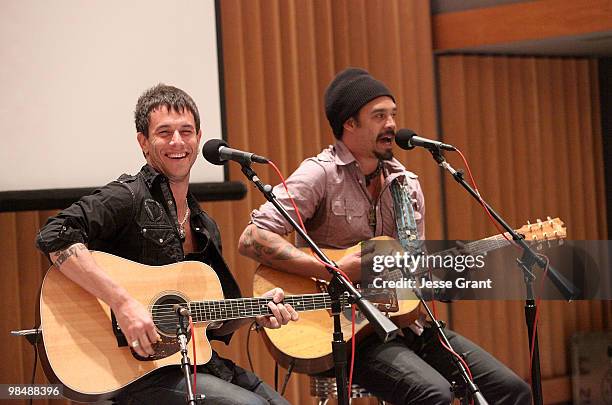 Musicians Jay Bowman and Michael Franti perform at the Capitol Records Tower on April 15, 2010 in Los Angeles, California.