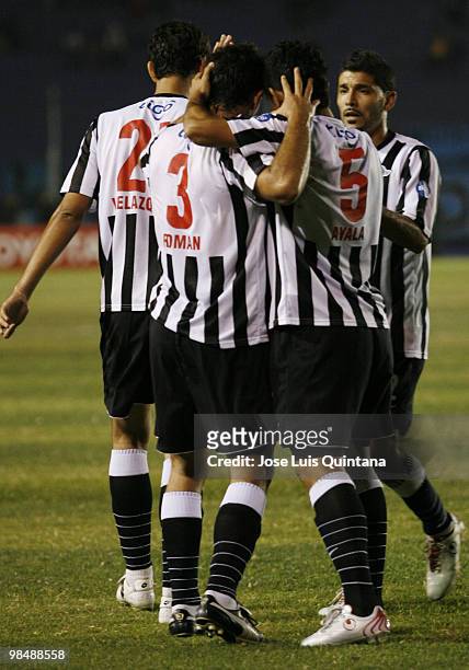 Players of Libertad celebrate scored goal by Adalberto Roaman during a match against Blooming at Ramon Aguilera Costa Stadium on April 15, 2010 in...