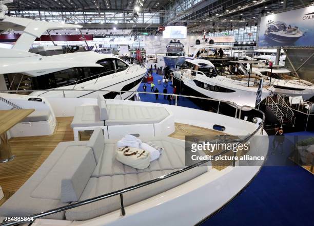 Vistors of the motor boat and water sports fair 'boot' inspect motor yachts in Duesseldorf, Germany, 20 January 2018. The fair is taking place from...