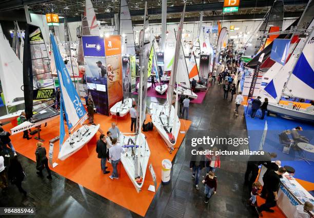 Vistors of the motor boat and water sports fair 'boot' inspect motor yachts in Duesseldorf, Germany, 20 January 2018. The fair is taking place from...