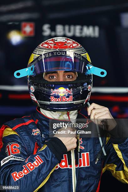 Sebastien Buemi of Switzerland and Scuderia Toro Rosso prepares to drive during practice for the Chinese Formula One Grand Prix at the Shanghai...