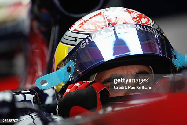 Sebastien Buemi of Switzerland and Scuderia Toro Rosso prepares to drive during practice for the Chinese Formula One Grand Prix at the Shanghai...