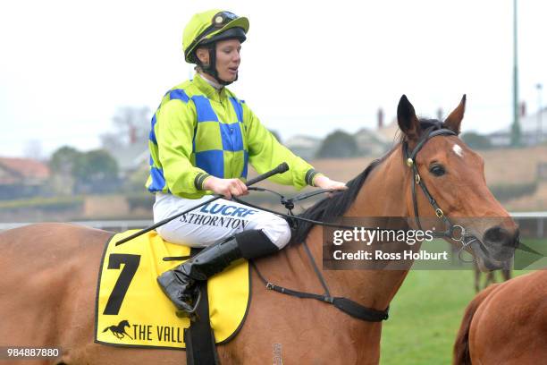 Stephanie Thornton returns to the mounting yard on Belwazi after winning the Sheamus Mills Bloodstock Handicap at Moonee Valley Racecourse on June...