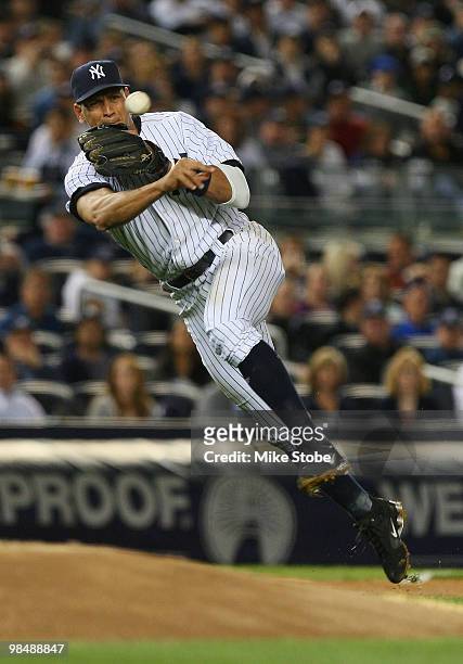 Alex Rodriguez of the New York Yankees makes a play on a ground ball against the Los Angeles Angels of Anaheim on April 15, 2010 in the Bronx borough...