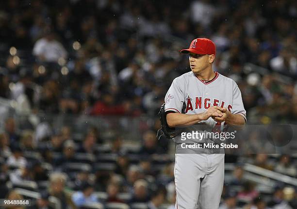 Pitcher Scott Kazmir of the Los Angeles Angels of Anaheim pauses during action against the New York Yankees on April 15, 2010 in the Bronx borough of...