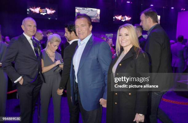 Actor Arnold Schwarzenegger and his girlfriend Heather Milligan pictured at the Kitz Race Club Party 2018 in Kitzbuehel, Austria, 20 January 2018....